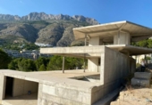 Отдельно стоящий дом с участком на продажу в городе Altea Фото