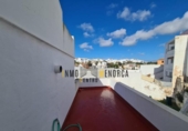 Отдельно стоящий дом с участком на продажу в городе Ciutadella de Menorca Фото