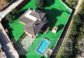 Отдельно стоящий дом с участком на продажу в городе Palma de Gandía Фото