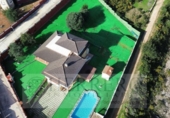 Отдельно стоящий дом с участком на продажу в городе Palma de Gandía Фото