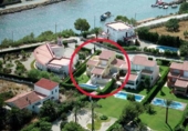 Отдельно стоящий дом с участком на продажу в городе l'Ametlla de Mar Фото
