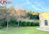 Отдельно стоящий дом с участком на продажу в городе Llagostera Фото