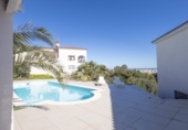 Отдельно стоящий дом с участком на продажу в городе El Real de Gandia Фото