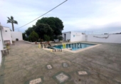 Отдельно стоящий дом с участком на продажу в городе Ciutadella de Menorca Фото