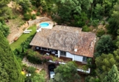 Отдельно стоящий дом с участком на продажу в городе Tossa de Mar Фото