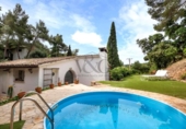 Отдельно стоящий дом с участком на продажу в городе Tossa de Mar Фото