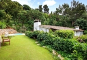 Отдельно стоящий дом с участком на продажу в городе Tossa de Mar Фото