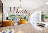 Отдельно стоящий дом с участком на продажу в городе Tossa de Mar Фото