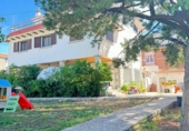 Отдельно стоящий дом с участком на продажу в городе Кольядо-Вильяльба Фото