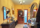 Отдельно стоящий дом с участком на продажу в городе Кольядо-Вильяльба Фото
