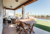 Отдельно стоящий дом с участком на продажу в городе San Antonio de Benagéber Фото