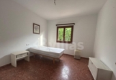 Отдельно стоящий дом с участком на продажу в городе Ciutadella de Menorca Фото