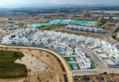 Отдельно стоящий дом с участком на продажу в городе Los Alcázares Фото