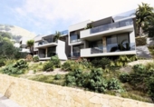 Отдельно стоящий дом с участком на продажу в городе Altea Фото