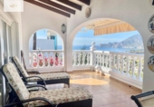 Отдельно стоящий дом с участком на продажу в городе Altea Фото