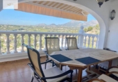 Отдельно стоящий дом с участком на продажу в городе Altea Фото