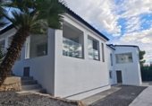 Отдельно стоящий дом с участком на продажу в городе Altea Фото