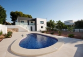 Отдельно стоящий дом с участком на продажу в городе Calpe Фото