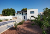 Отдельно стоящий дом с участком на продажу в городе Calpe Фото