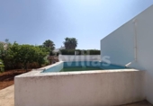 Отдельно стоящий дом с участком на продажу в городе Ciutadella de Menorca Фото