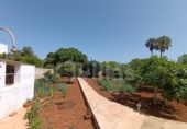 Отдельно стоящий дом с участком на продажу в городе Ciutadella de Menorca Фото