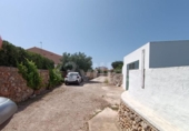 Отдельно стоящий дом с участком на продажу в городе Ciutadella de Menorca Фото