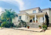 Отдельно стоящий дом с участком на продажу в городе l'Ametlla de Mar Фото