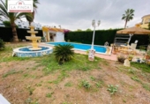 Chalet independiente con terreno en venta en la España, Málaga, ref: TR311864 foto