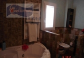 Отдельно стоящий дом с участком на продажу в городе Cartaya Фото