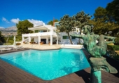 Отдельно стоящий дом с участком на продажу в городе Altea Фото