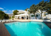 Отдельно стоящий дом с участком на продажу в городе Altea Фото