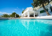 Отдельно стоящий дом с участком на продажу в городе Altea Фото