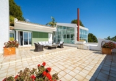 Отдельно стоящий дом с участком на продажу в городе Altea Фото
