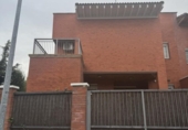 Отдельно стоящий дом с участком на продажу в городе Гвадалахара Фото
