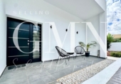 Отдельно стоящий дом с участком на продажу в городе Altea Фото