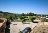 Загородный дом с участком на продажу в городе el Vendrell Фото