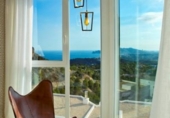 Отдельно стоящий дом с участком на продажу в городе Altea Фото