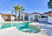 Отдельно стоящий дом с участком на продажу в городе Altea Фото