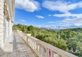 Отдельно стоящий дом с участком на продажу в городе Altea Фото