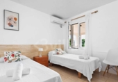 Отдельно стоящий дом с участком на продажу в городе Ciutadella de Menorca Фото