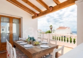 Отдельно стоящий дом с участком на продажу в городе Ciutadella de Menorca Фото