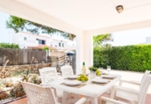 Отдельно стоящий дом с участком на продажу в городе Ciutadella de Menorca Фото