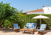 Отдельно стоящий дом с участком на продажу в городе Ciutadella de Menorca Фото