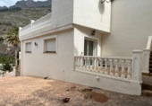 Отдельно стоящий дом с участком на продажу в городе Altea Фото