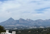Отдельно стоящий дом с участком на продажу в городе Altea Фото