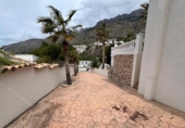 Отдельно стоящий дом с участком на продажу в городе Altea Фото
