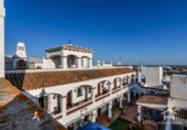 Отдельно стоящий дом с участком на продажу в городе Ayamonte Фото