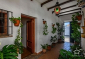 Отдельно стоящий дом с участком на продажу в городе Ayamonte Фото
