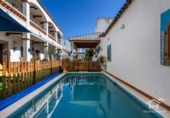 Отдельно стоящий дом с участком на продажу в городе Ayamonte Фото