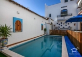 Отдельно стоящий дом с участком на продажу в городе Ayamonte Фото